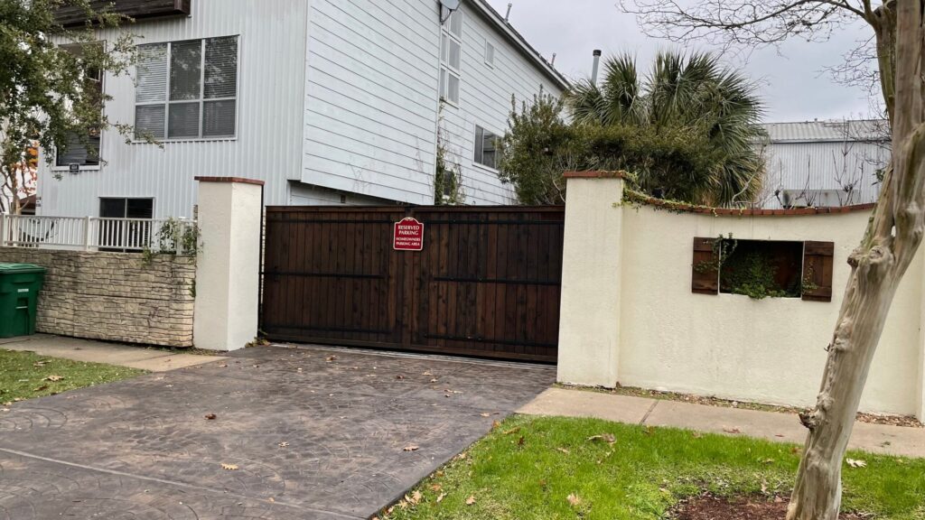 Iron driveway gate at a residential home